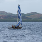 Louisiade boat people (image by Mark Beaman)