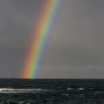 Rainbow on the Hawaiian ocean (image by Pete Morris)
